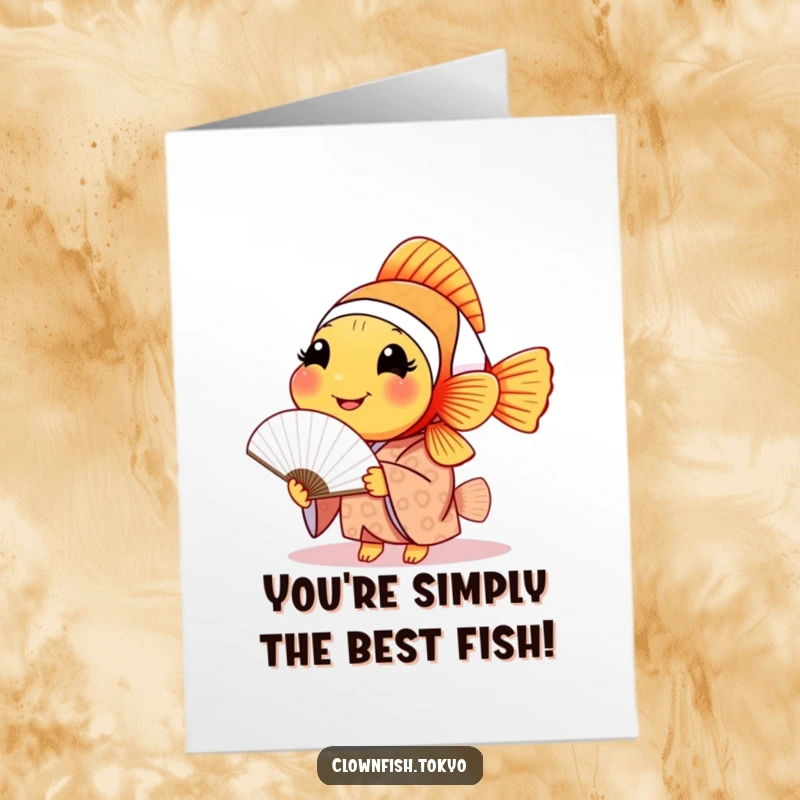 Funny Free Printable congratulations card with a smiling clownfish dressed in a patterned kimono, holding a delicate paper fan.