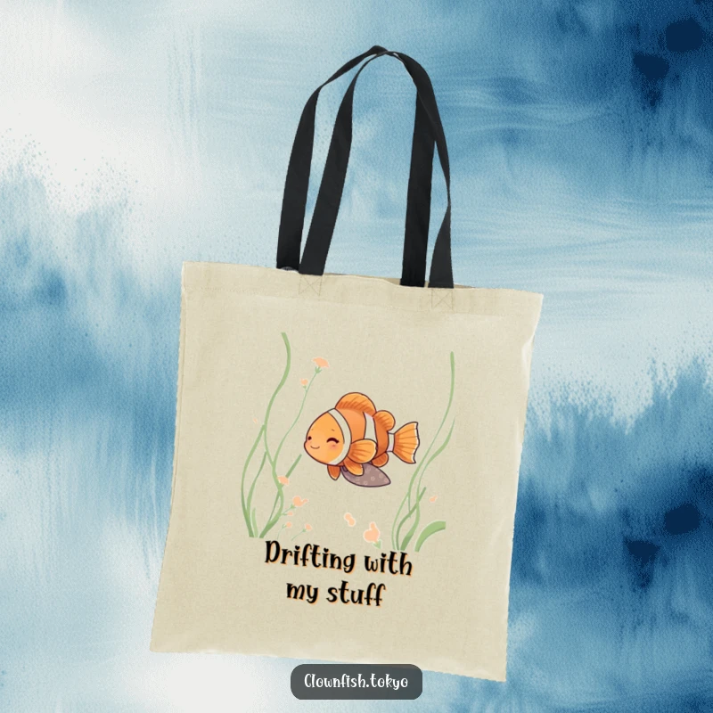 Funny clownfish tote bag, a serene fish in a muted kimono drifting peacefully amongst flowing weeds.